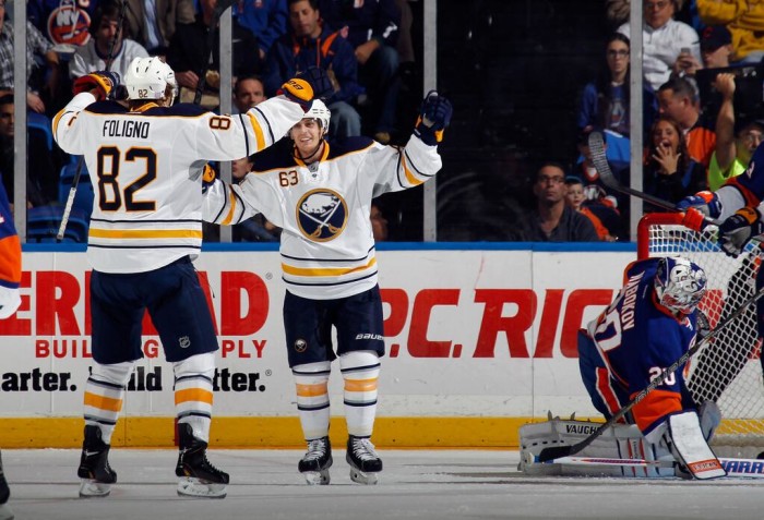Sabres rally late, collect first win