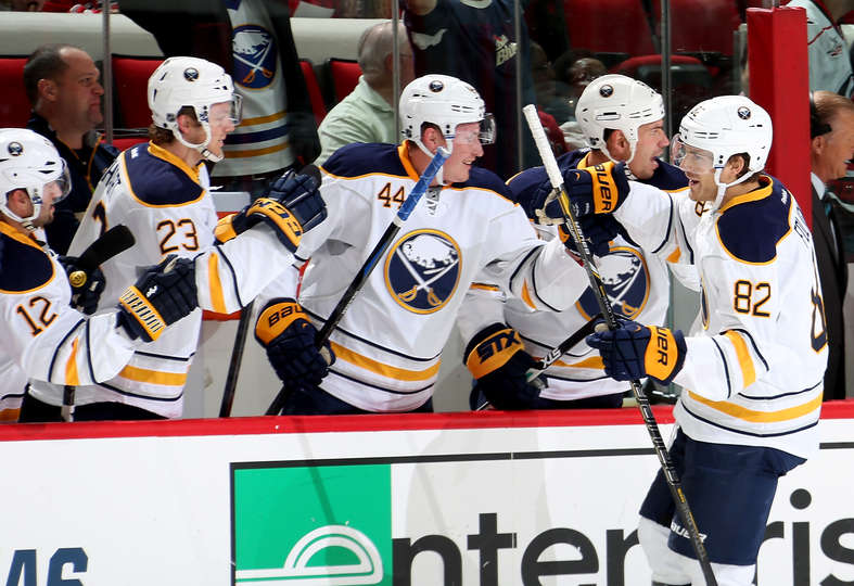 Sabres stumble late, hold on for first win of year
