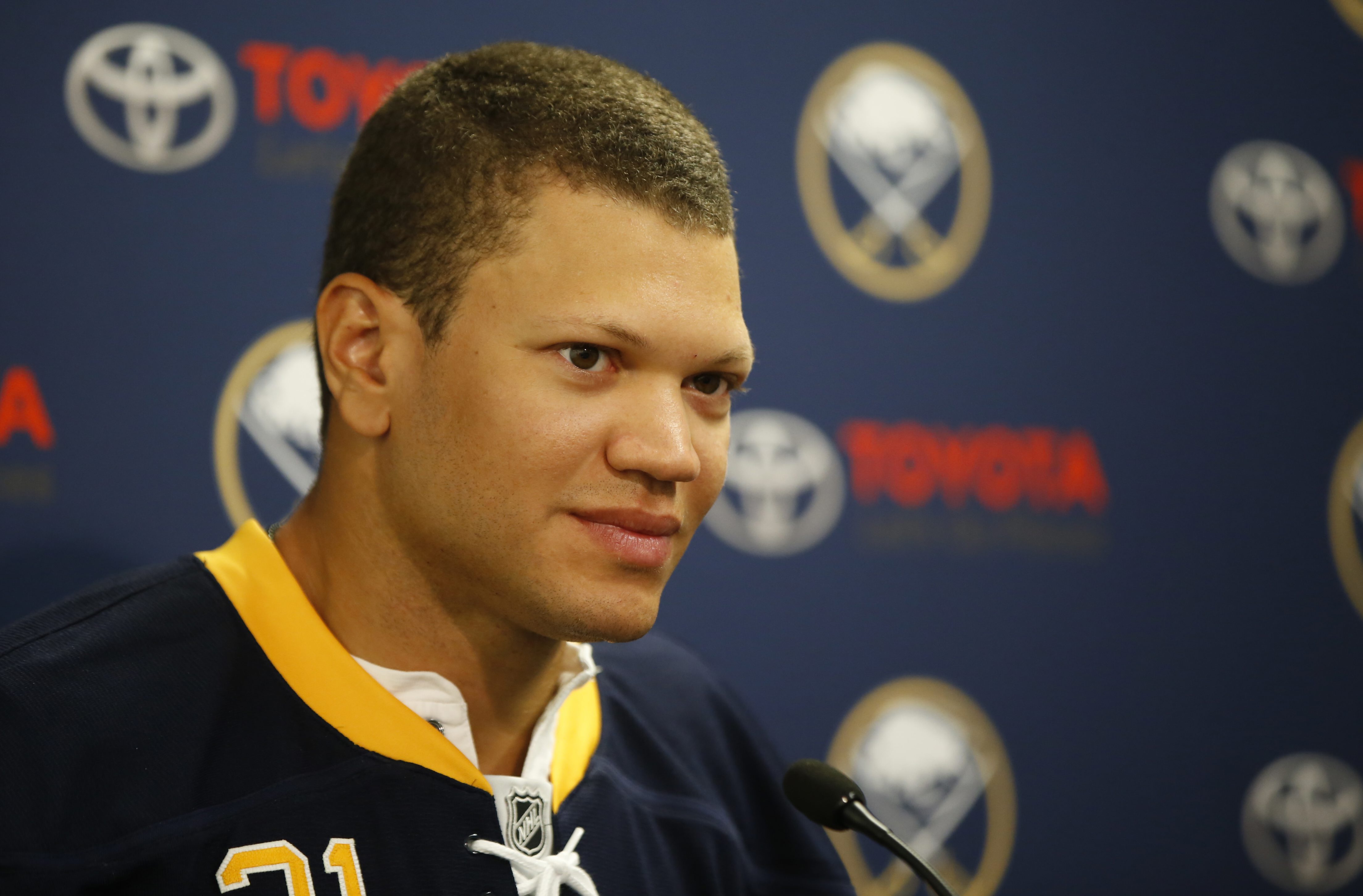 what nationality is kyle okposo